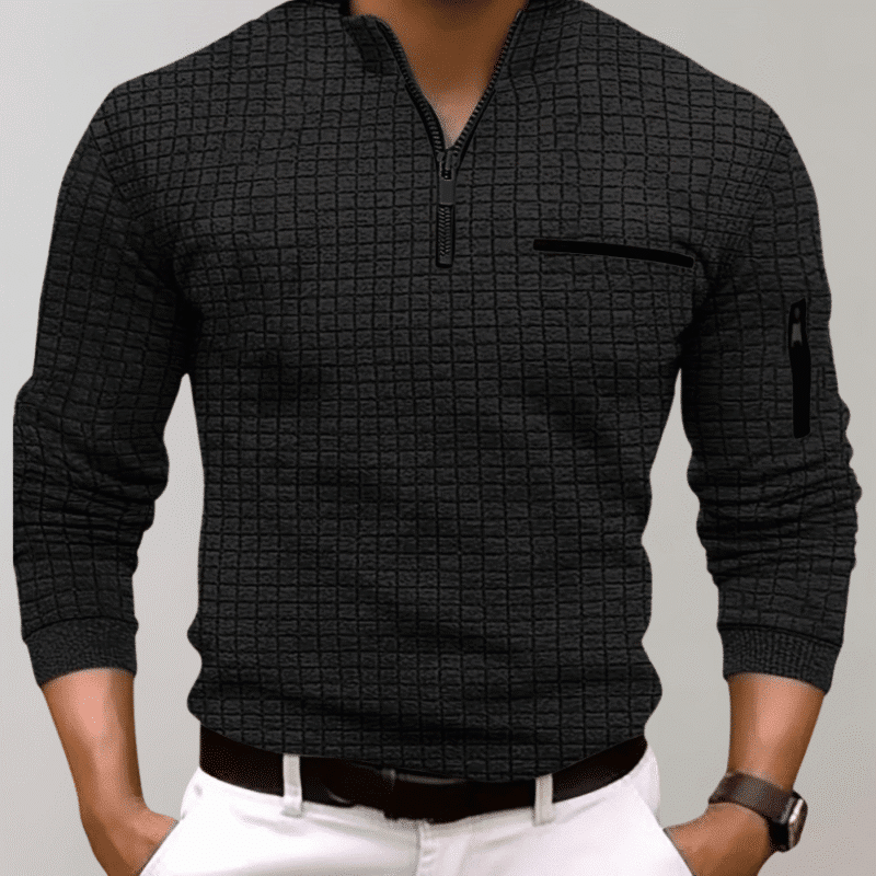 Zwart gebreid poloshirt voor heren met rits, lange mouwen en borstzak, ideaal voor casual en zakelijke outfits. Stijlvol en veelzijdig herenkleding.