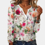 Casual gebloemde damesblouse met kleurrijke bloemenprint, lange mouwen en V-hals. Perfect voor lente- en zomermode. Trendy en stijlvol design.