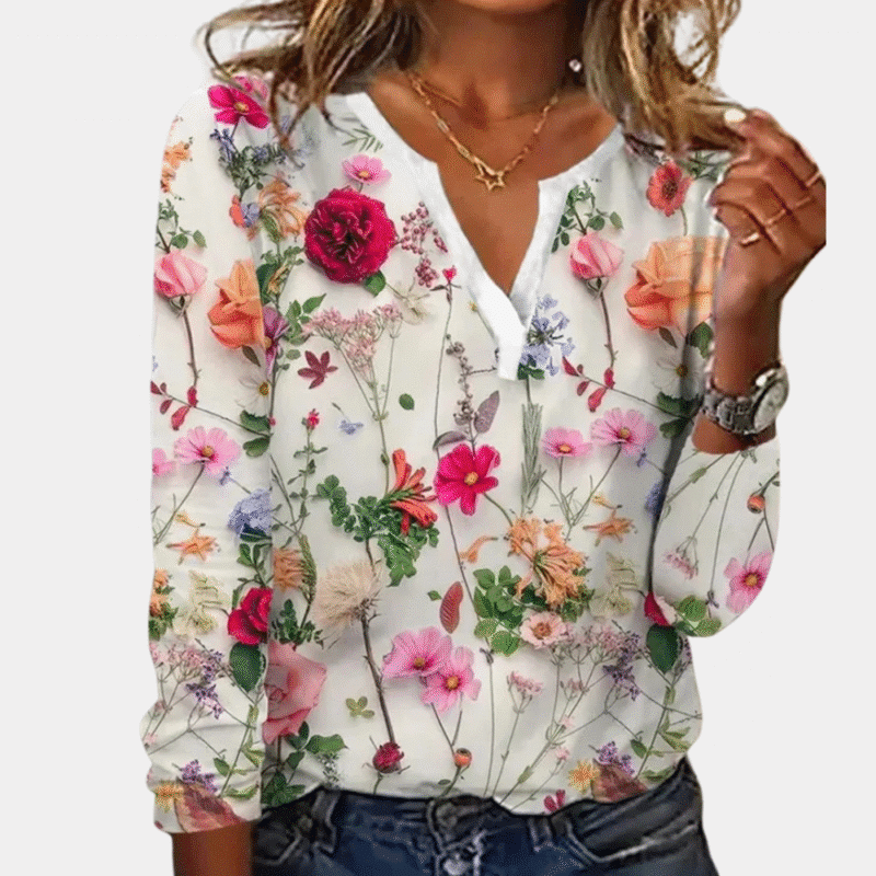 Casual gebloemde damesblouse met kleurrijke bloemenprint, lange mouwen en V-hals. Perfect voor lente- en zomermode. Trendy en stijlvol design.