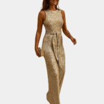 Gouden glitter jumpsuit voor dames, mouwloos met ceintuur, perfect voor feestelijke gelegenheden. Elegant en stijlvol avondkleding.